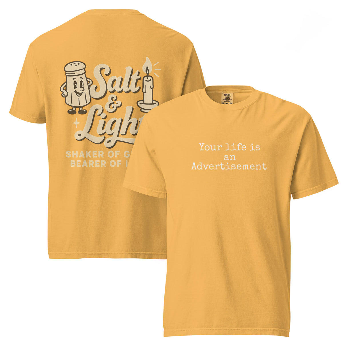 Double-sided mustard Comfort Colors Christian t-shirt showing ‘Your life is an Advertisement’ on the front and retro Salt & Light graphic with ‘Shaker of Grace, Bearer of Light’ on the back. Salt and Light Merch