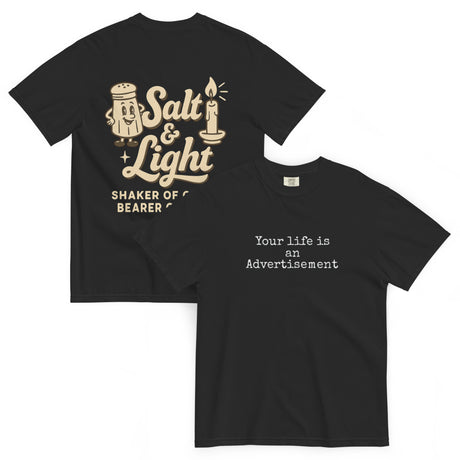 Double-sided black Comfort Colors Christian t-shirt showing ‘Your life is an Advertisement’ on the front and retro Salt & Light graphic with ‘Shaker of Grace, Bearer of Light’ on the back. Salt and Light Merch