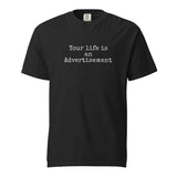 Black Comfort Colors Christian t-shirt with the phrase ‘Your life is an Advertisement’ in simple white typewriter font on the front. Salt and Light Merch